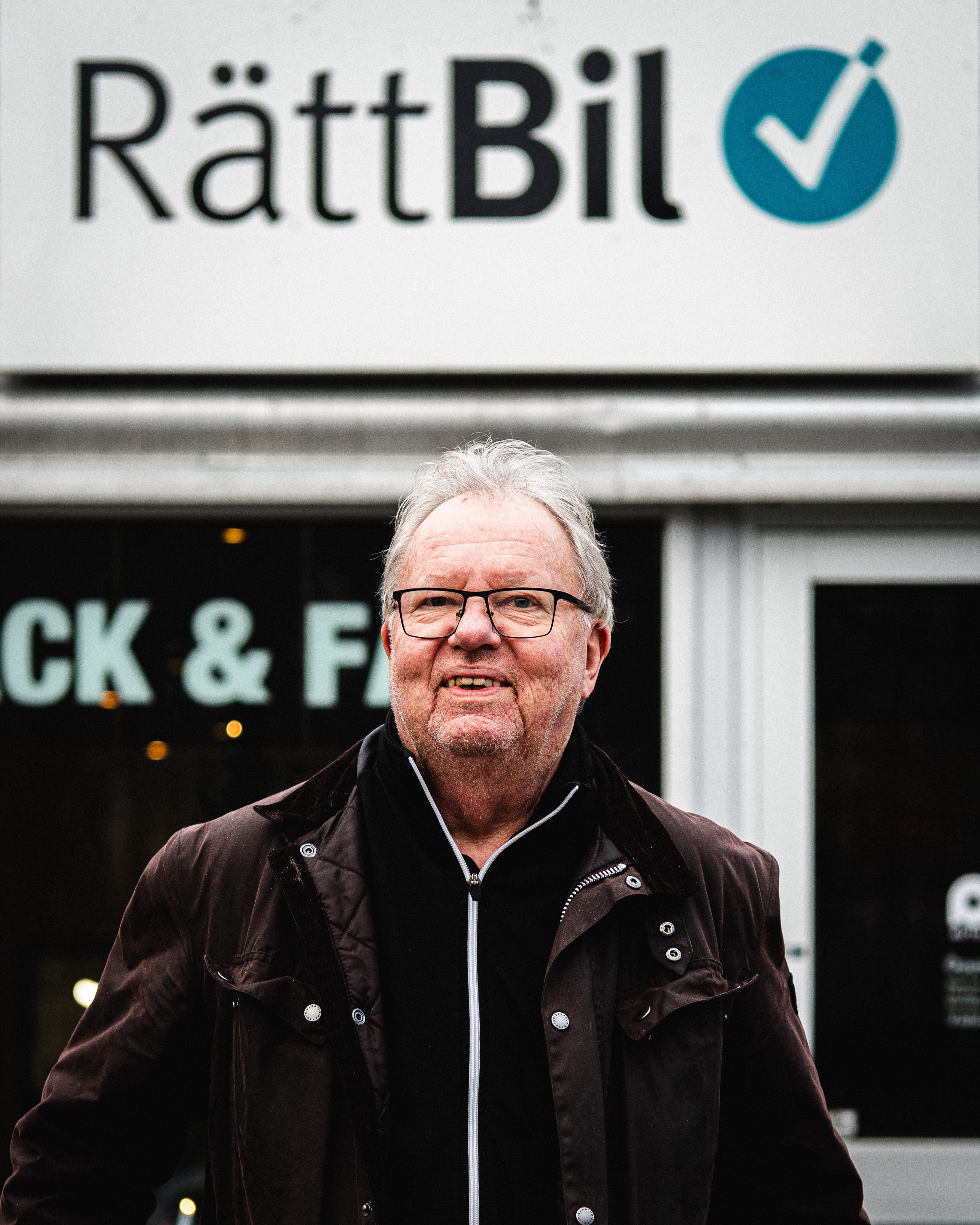 Modern luxury car showroom interior with premium vehicles on display
